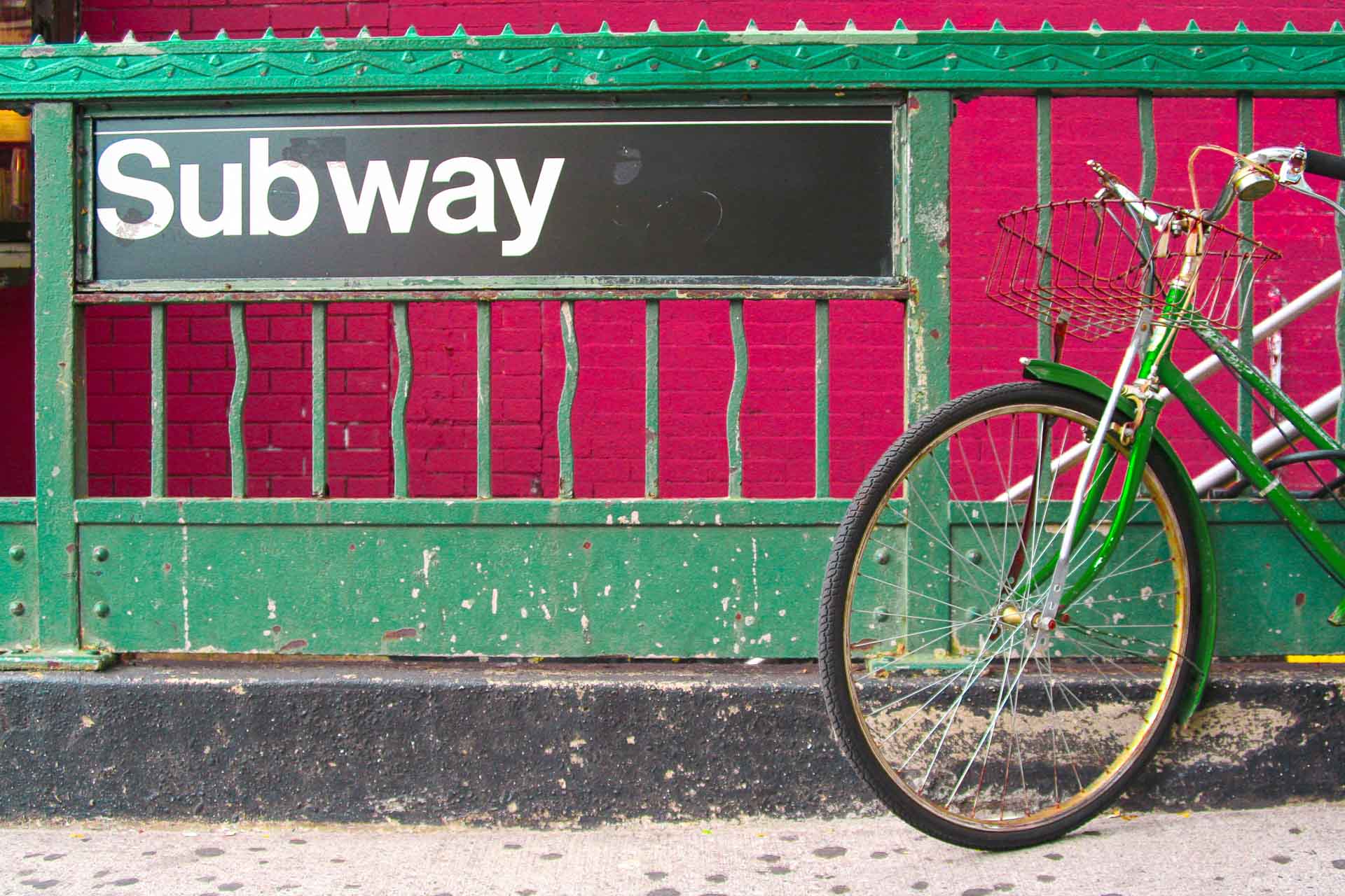 New York City Subway Entrance and green bicycle