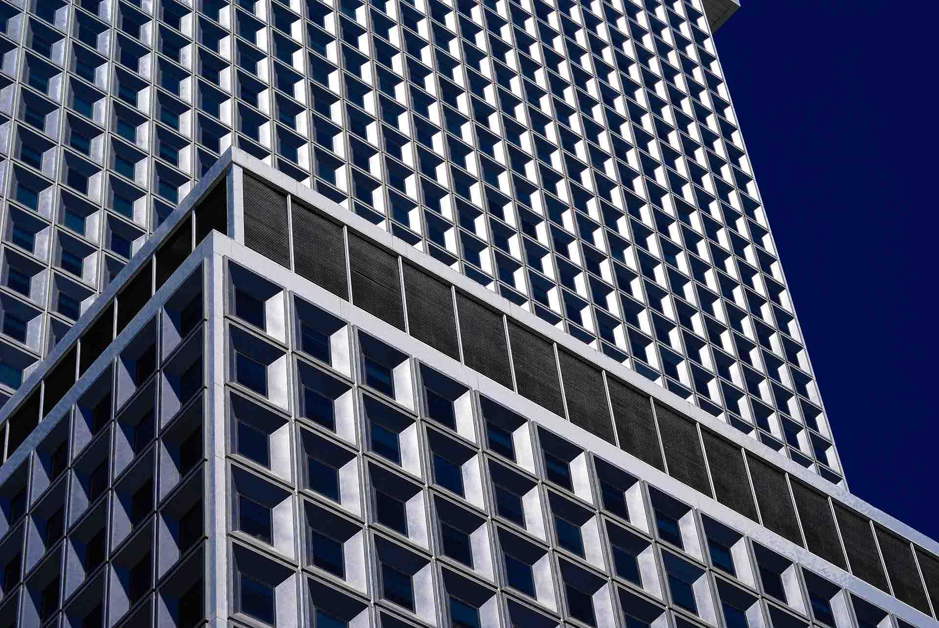 repetitive square windows on a new york city skyscraper